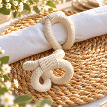 โหลดรูปภาพลงในเครื่องมือใช้ดูของ Gallery Madeleine Napkin Rings - ห่วงรัดผ้าเช็ดปากทำมือ - on-white-napkin-and-foreground-placemat - cream - Made in Thailand
